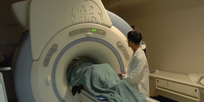 960px MRI machine with patient 23423505123